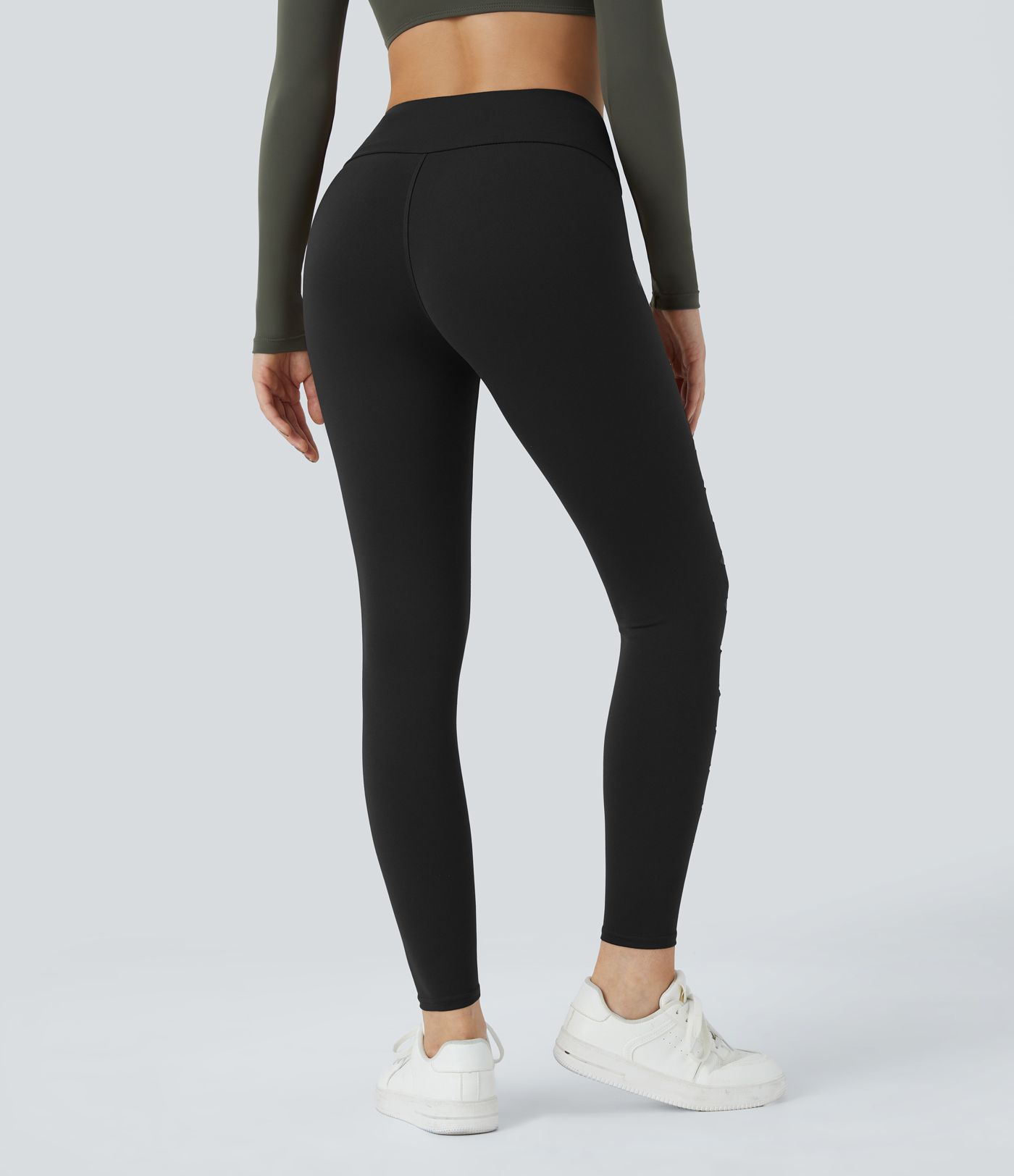 Leggings rasgados con agujeros de tiro alto