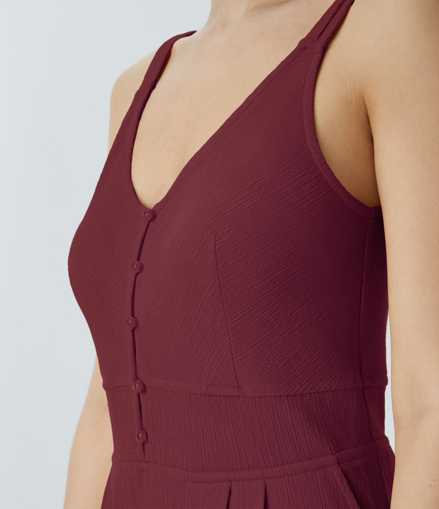 Mono pierna ancha bolsillo lateral botón cuello V tirante doble