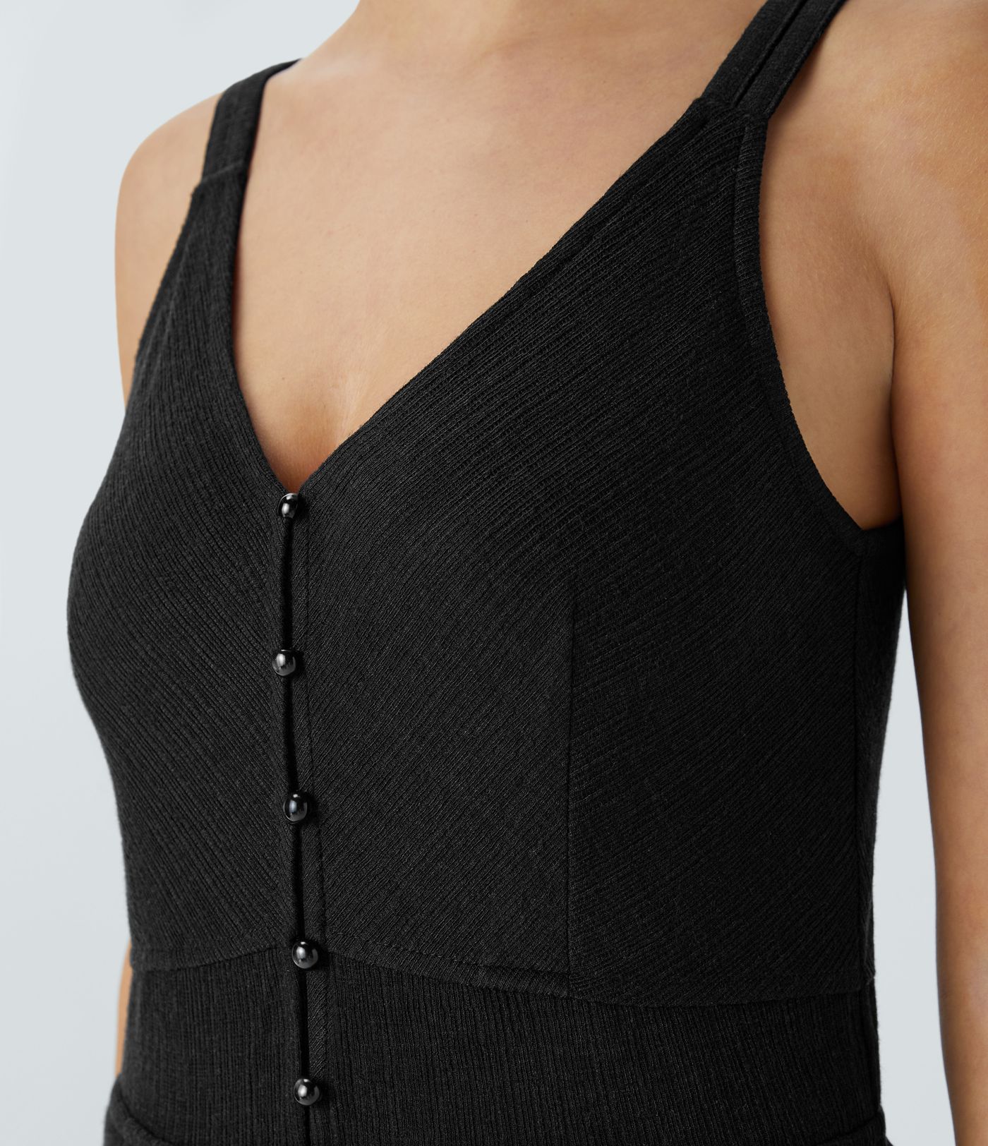 Mono pierna ancha bolsillo lateral botón cuello V tirante doble