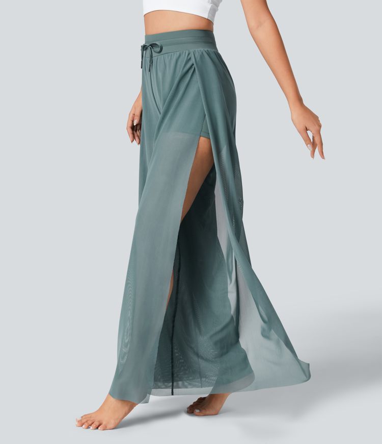 Pantalón yoga fluido pierna ancha bolsillo lateral 2 en 1 abertura malla contrastante cordón tiro alto