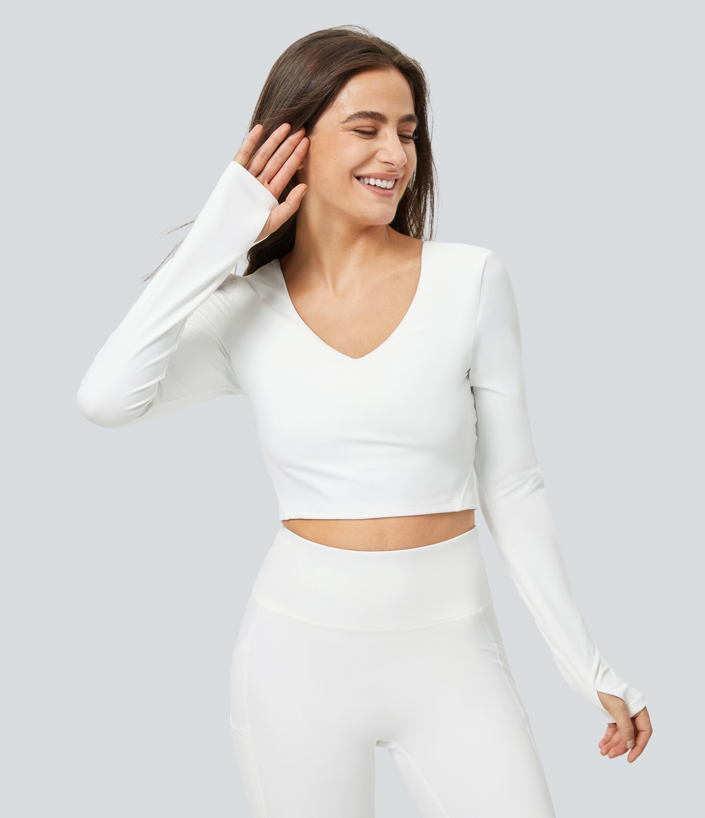 Padded V-neck and thumb hole-free cropped yoga sports top