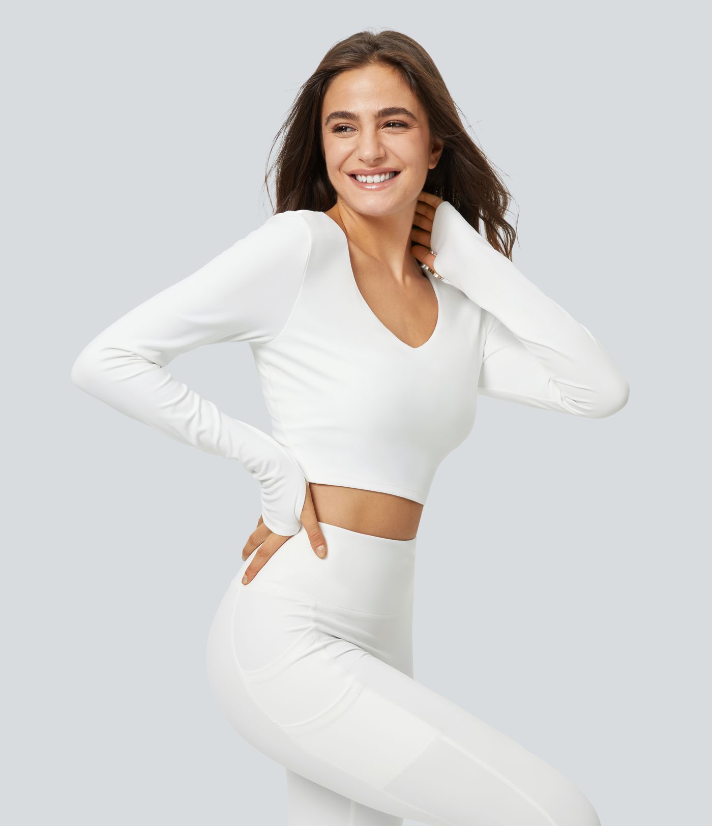Padded V-neck and thumb hole-free cropped yoga sports top