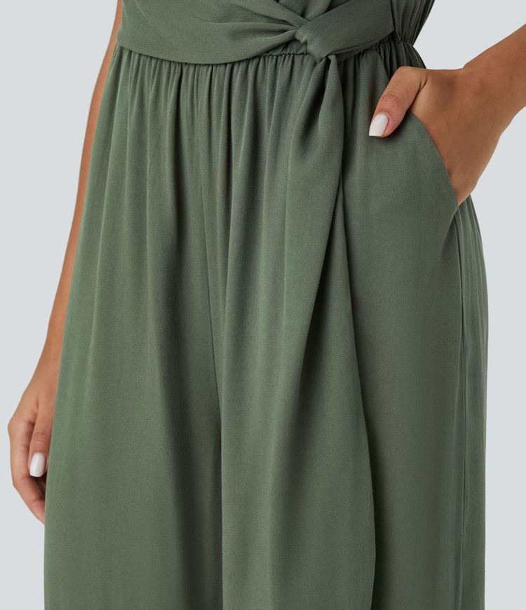 Mono resort pierna ancha bolsillo lateral cinturón plisado sin espalda