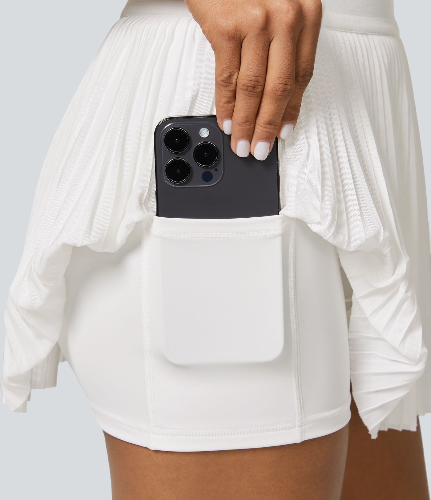 Minifalda tenis plisada malla contrastante bolsillo lateral 2 en 1 tiro alto