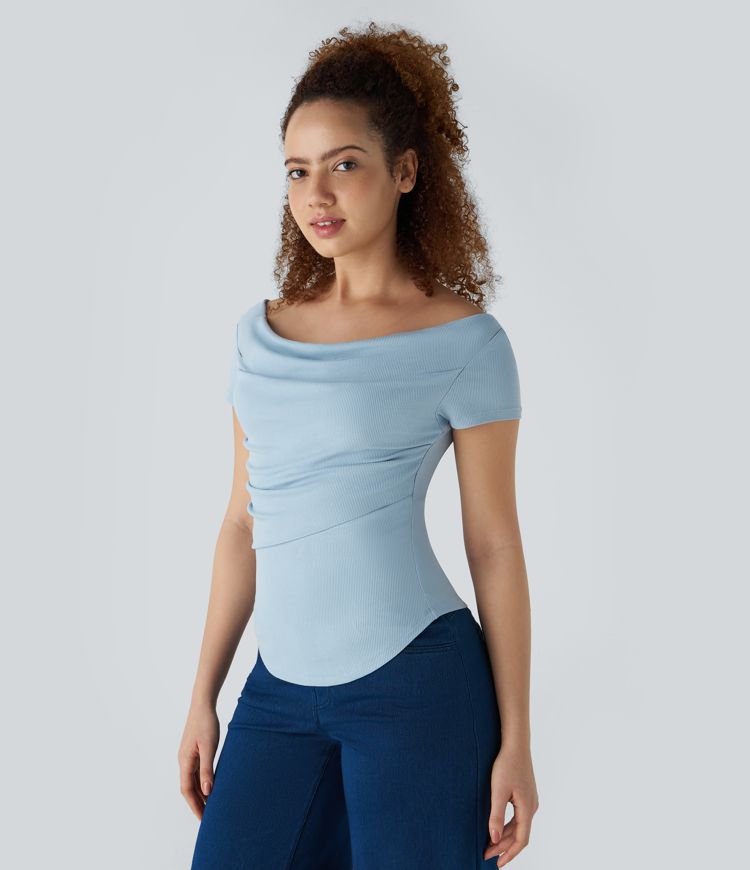 Ribbed knit boatneck top with pleated detail, curved hem, and skinny fit - casual style