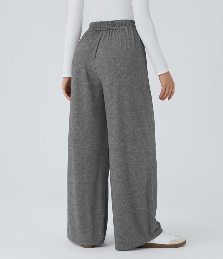 Pantalón tiro alto pierna ancha bolsillo lateral efecto jaspeado