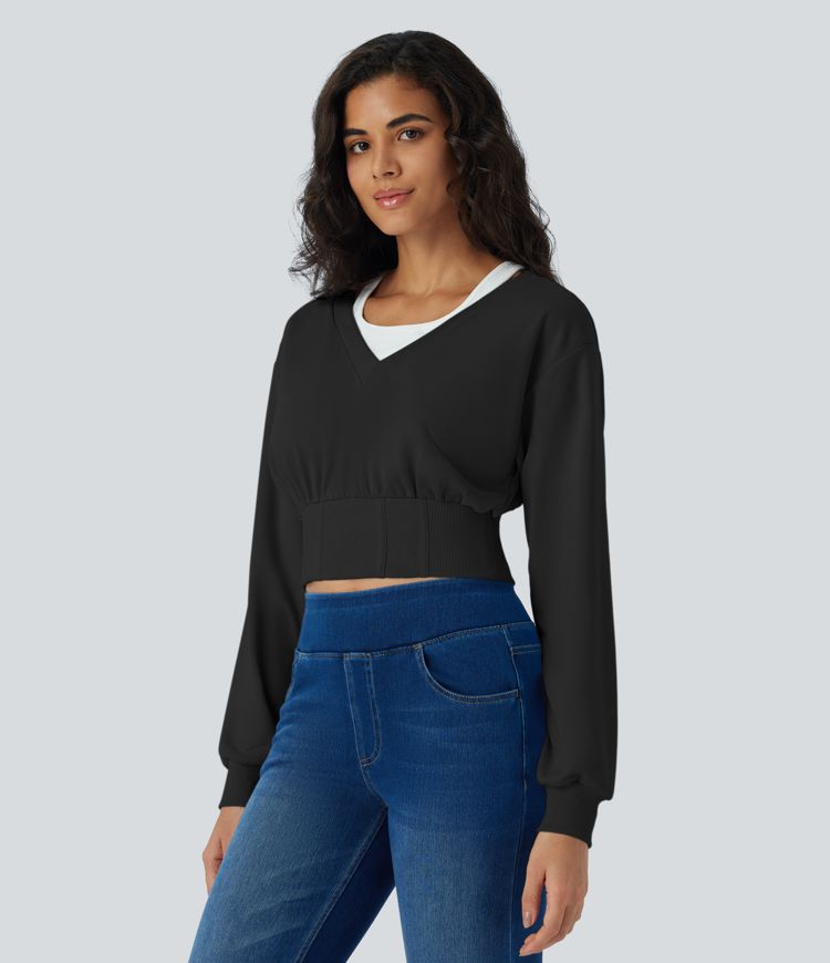 Sudadera corta corsé manga larga bloque color