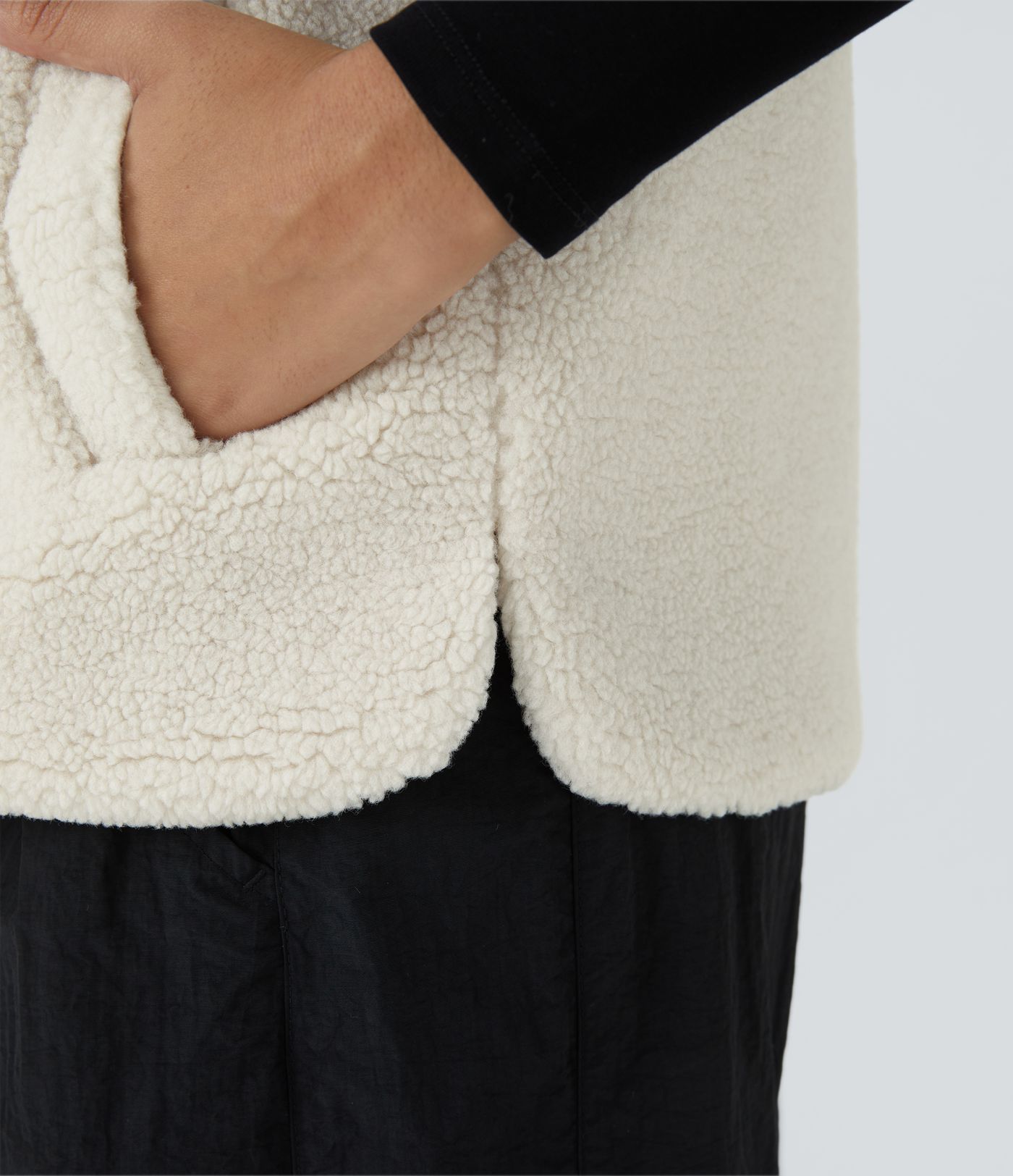 Chaleco sherpa bolsillo lateral cremallera cuello alto