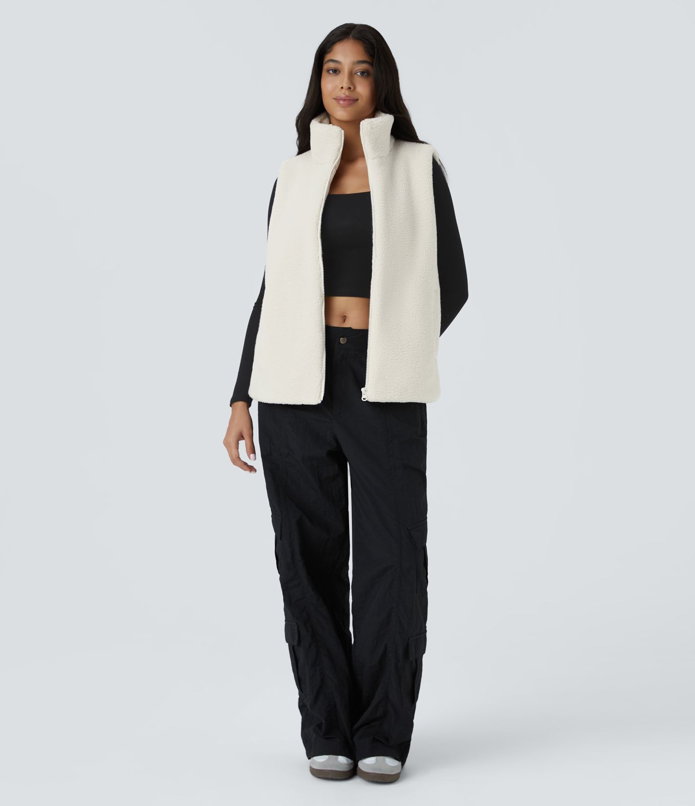 Chaleco sherpa bolsillo lateral cremallera cuello alto