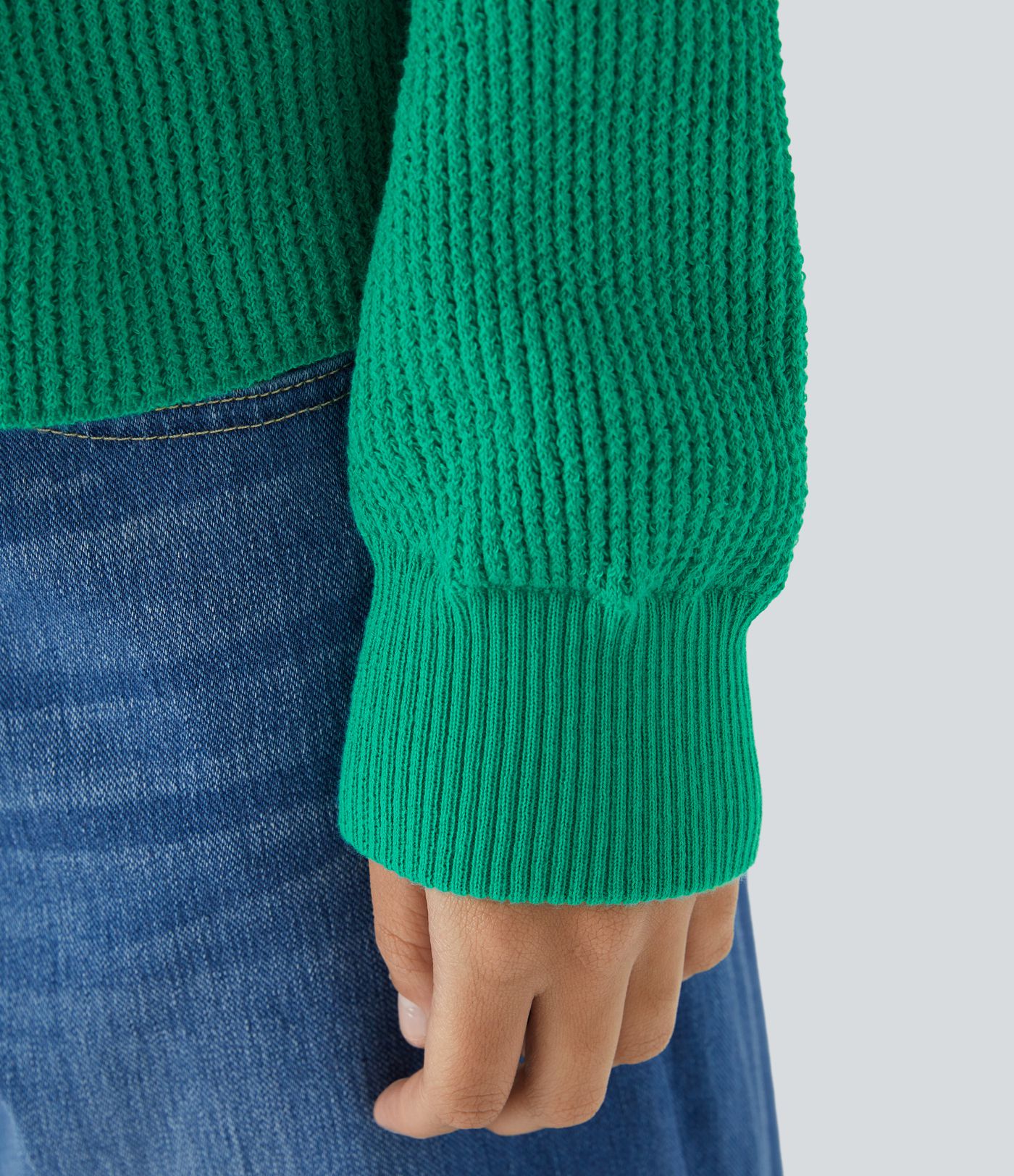 Suéter manga larga botón delantera cuello redondo