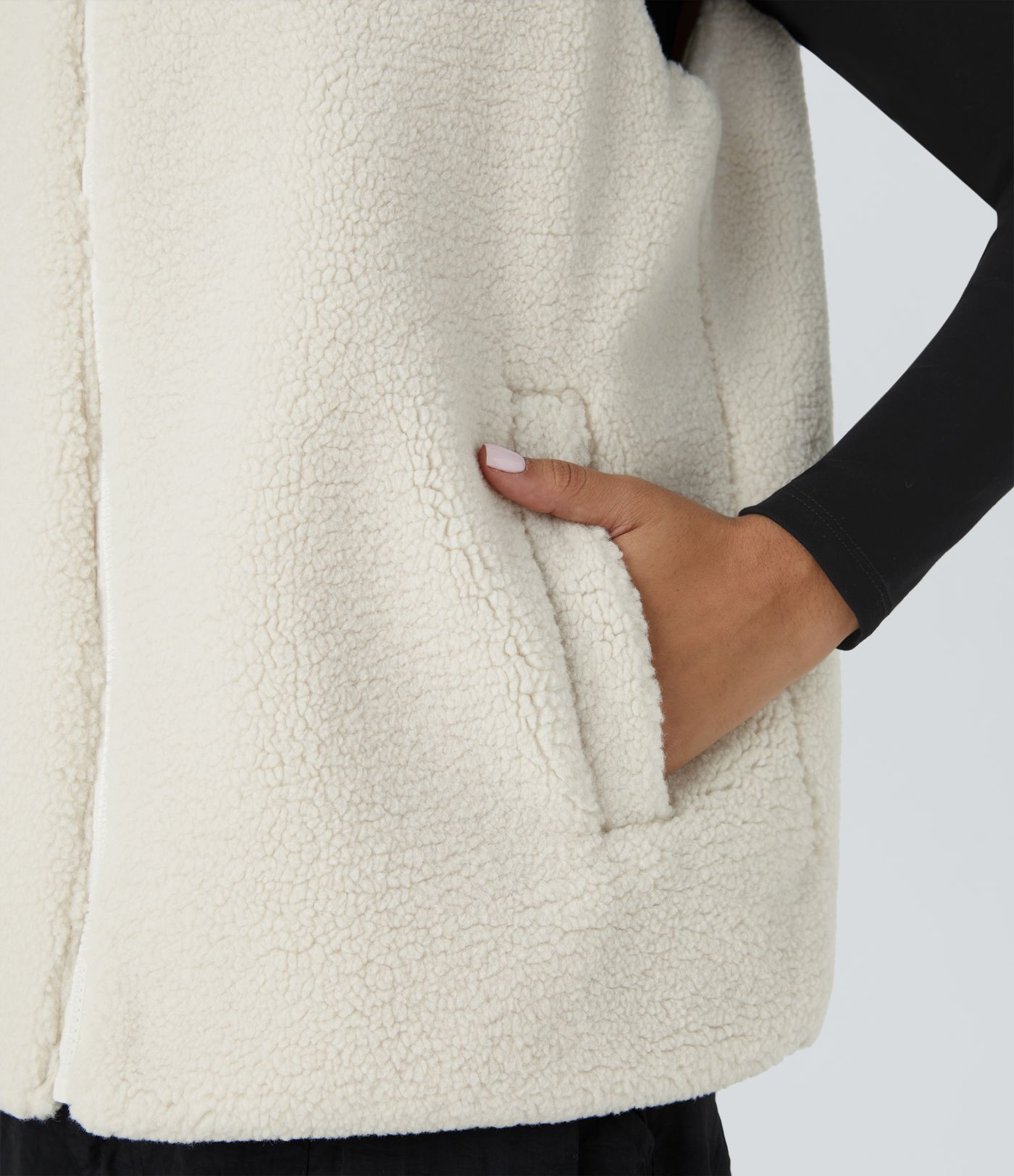 Chaleco sherpa bolsillo lateral cremallera cuello alto