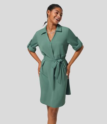 Lockeres Arbeitshemdkleid mit Kragen, hochgekrempelten Ärmeln und Gürtel Lockeres Arbeitshemdkleid mit Kragen, hochgekrempelten Ärmeln und Gürtel