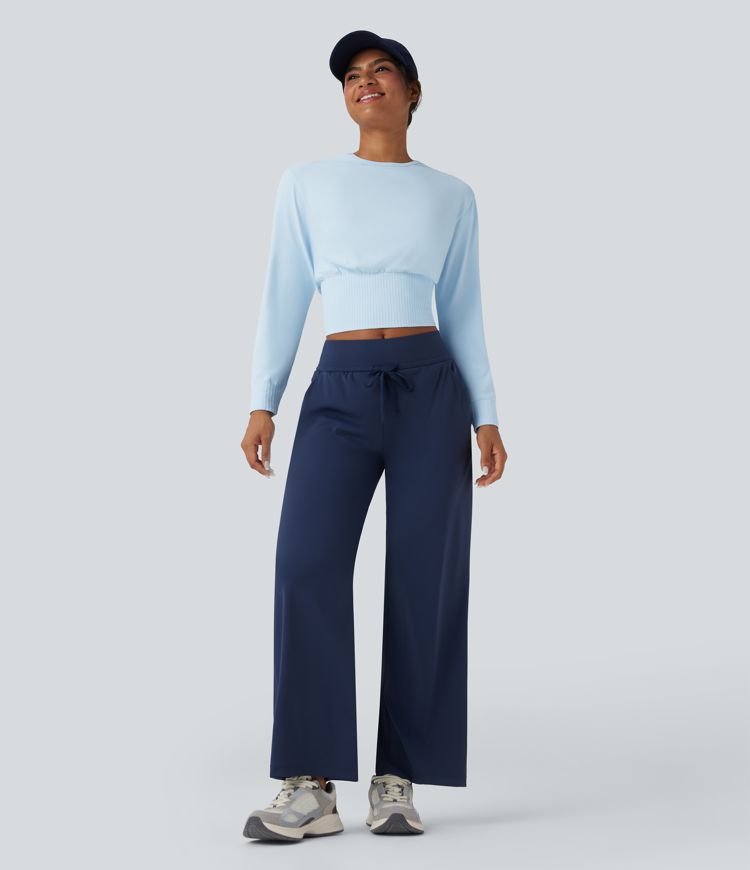 Top deportivo de entrenamiento de manga larga con cuello redondo y sin costuras