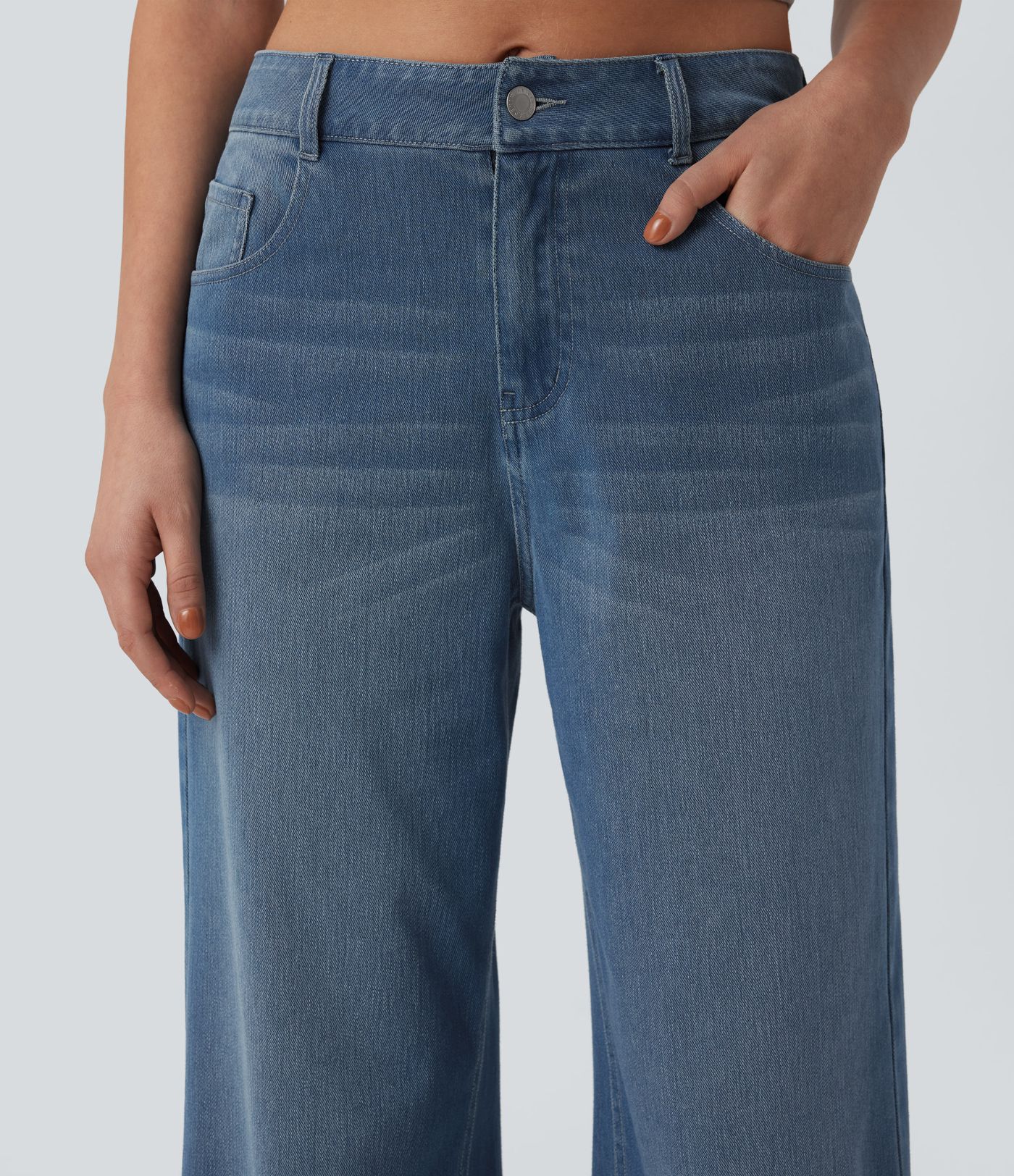 Halara Flex™ vaqueros campanados de tiro medio, de corte relajado, con bolsillos