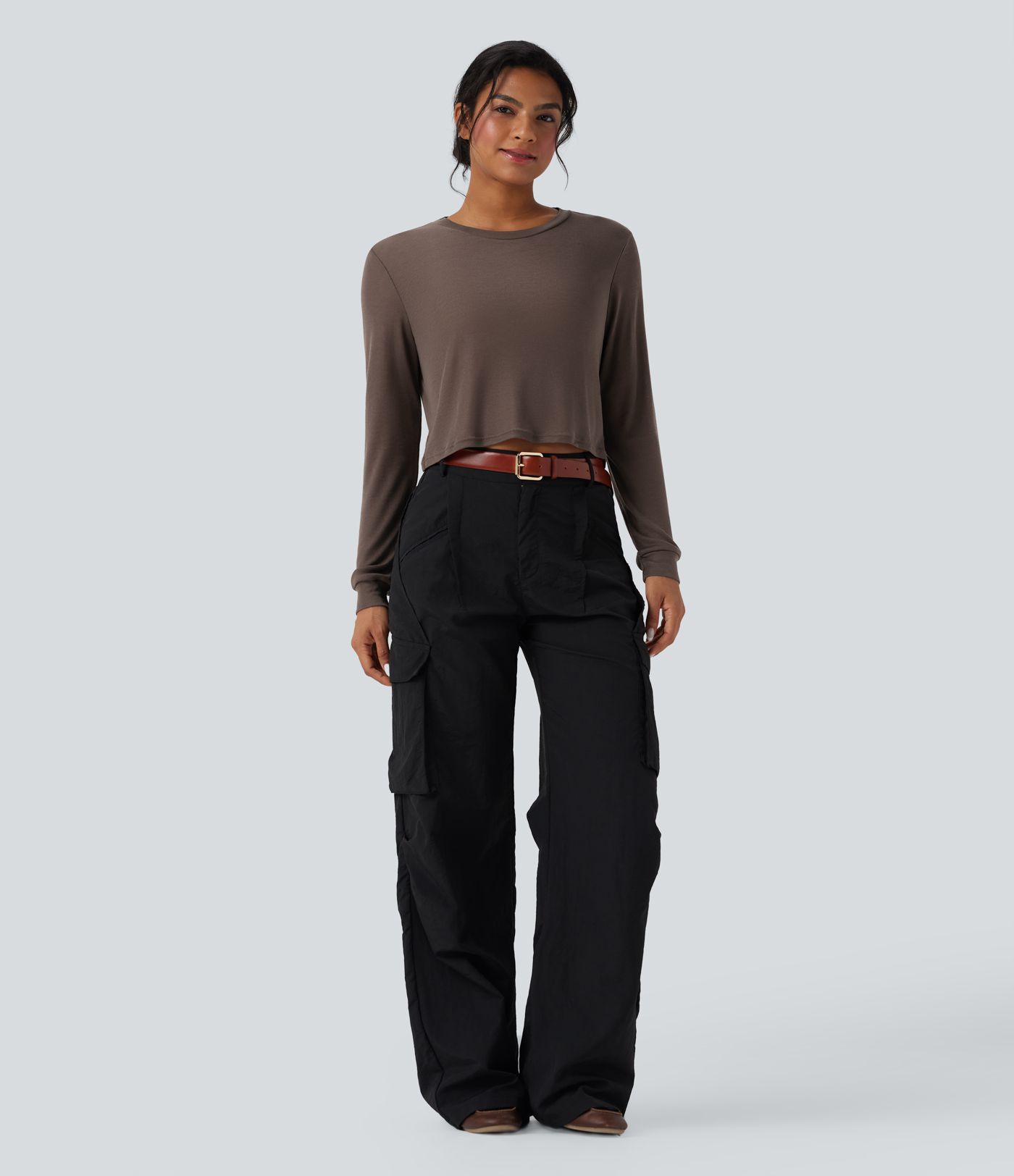 Laisvas vilnonis viršus su apvalia iškirpte ir ilgomis rankovėmis