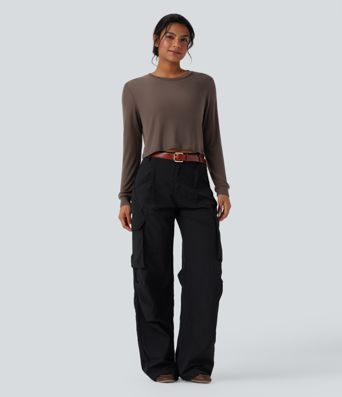 Laisvas vilnonis viršus su apvalia iškirpte ir ilgomis rankovėmis