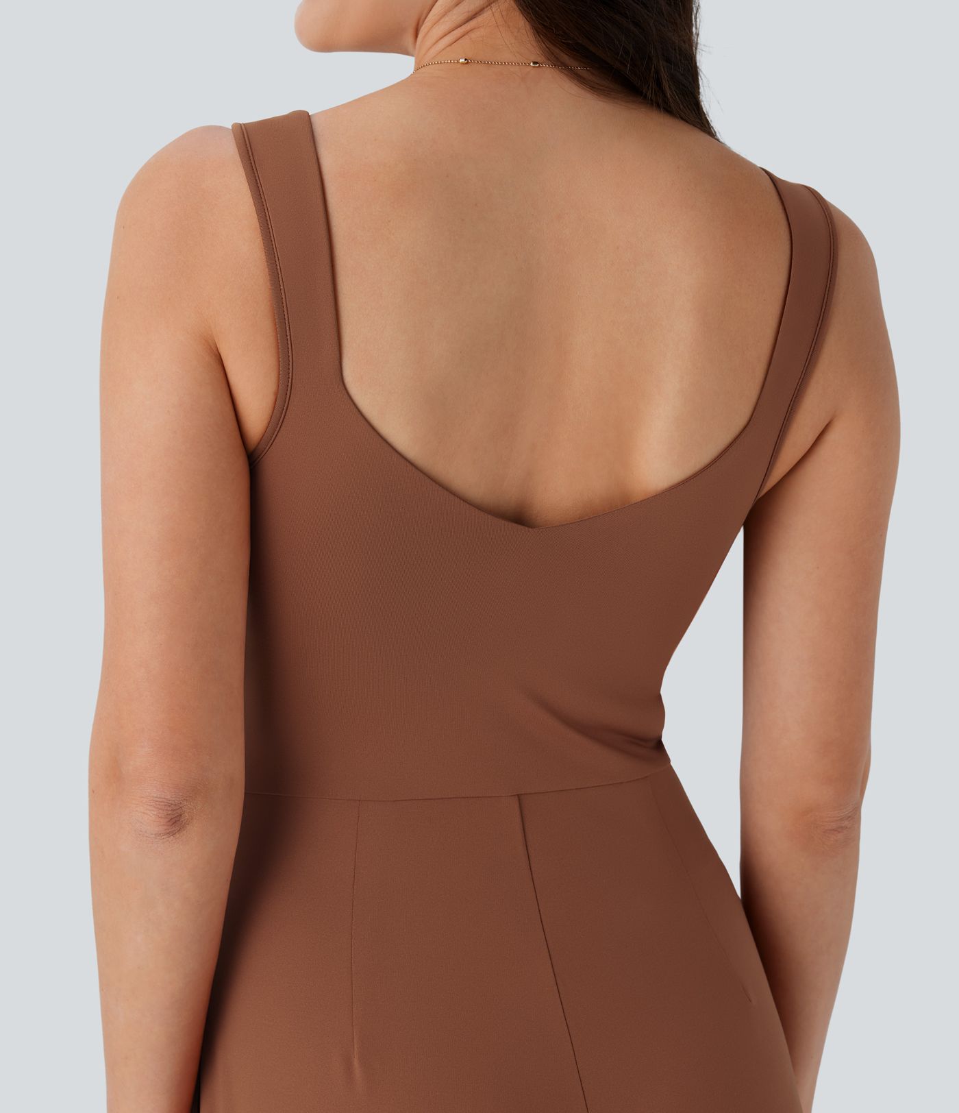 Jumpsuit casual sin mangas con espalda en U y bolsillos