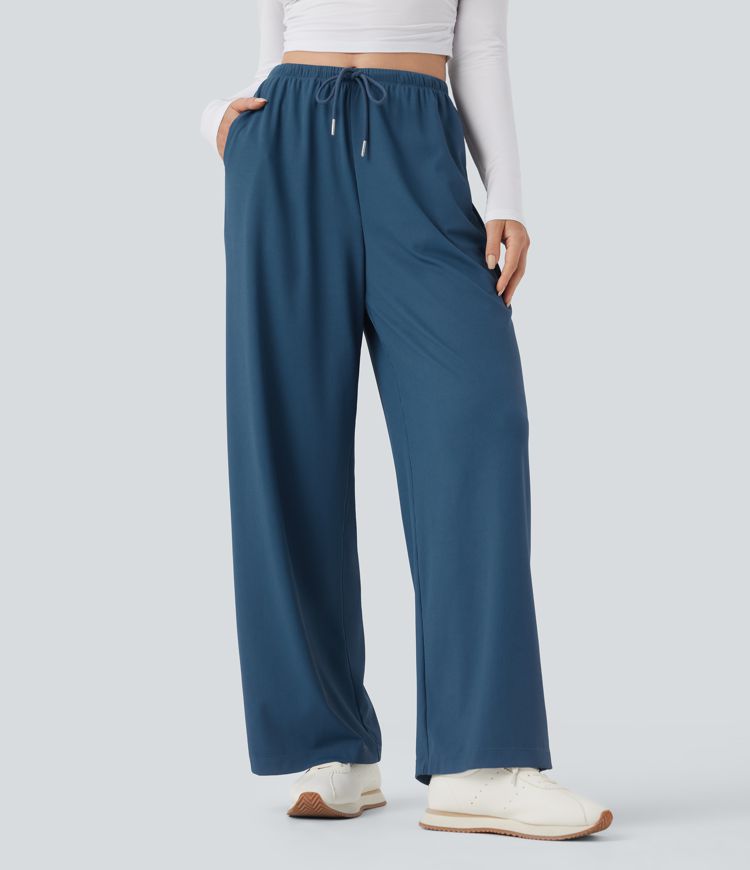 Pantalones de yoga rectos de tiro medio con cordón y tejido gofre con bolsillos