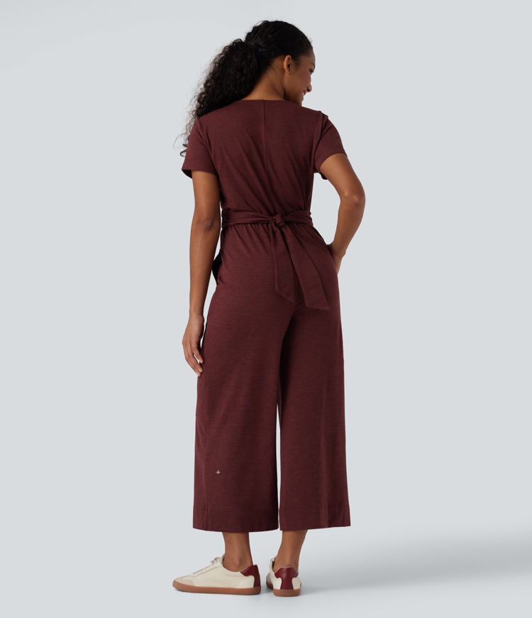 Combinaison décontractée col V manches courtes drapée liens dos jambe droite avec poches