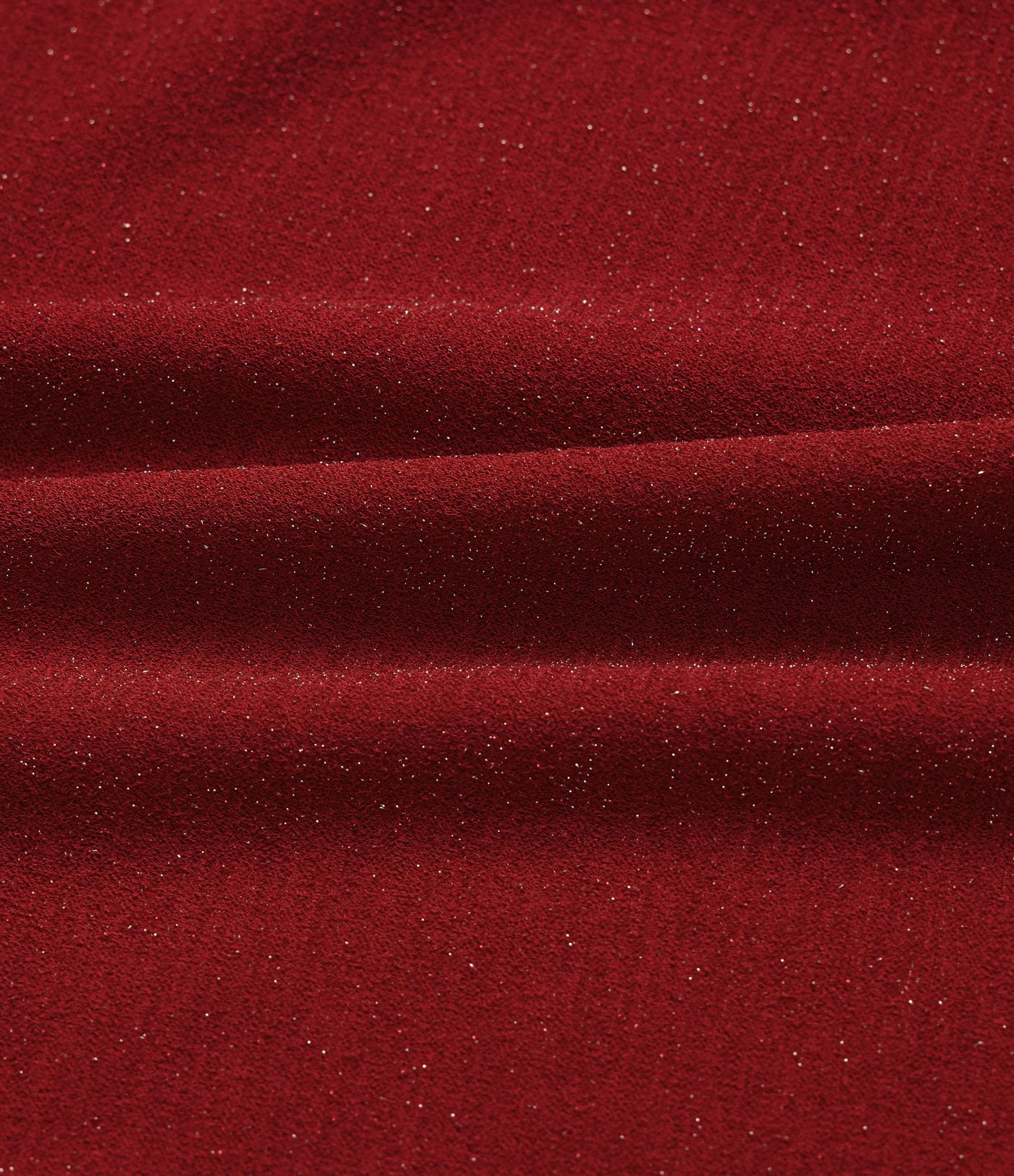 Top de cuello redondo de manga larga con acabado metálico