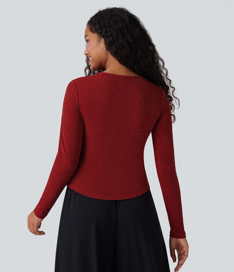 Top de cuello redondo de manga larga con acabado metálico