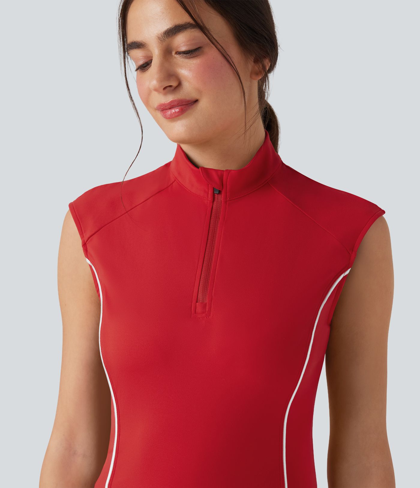 Softlyzero™ Plush - Sleeveless, 2-piece golf activewear dress with turtleneck, side pockets, golf tee pockets, and color block pattern