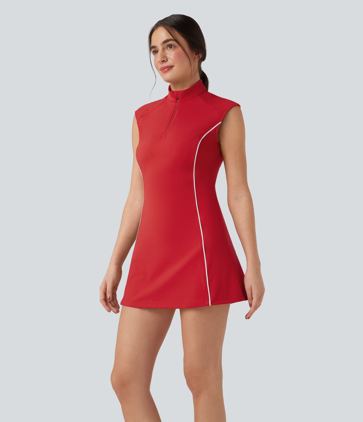 Softlyzero™ Plush - Sleeveless, 2-piece golf activewear dress with turtleneck, side pockets, golf tee pockets, and color block pattern