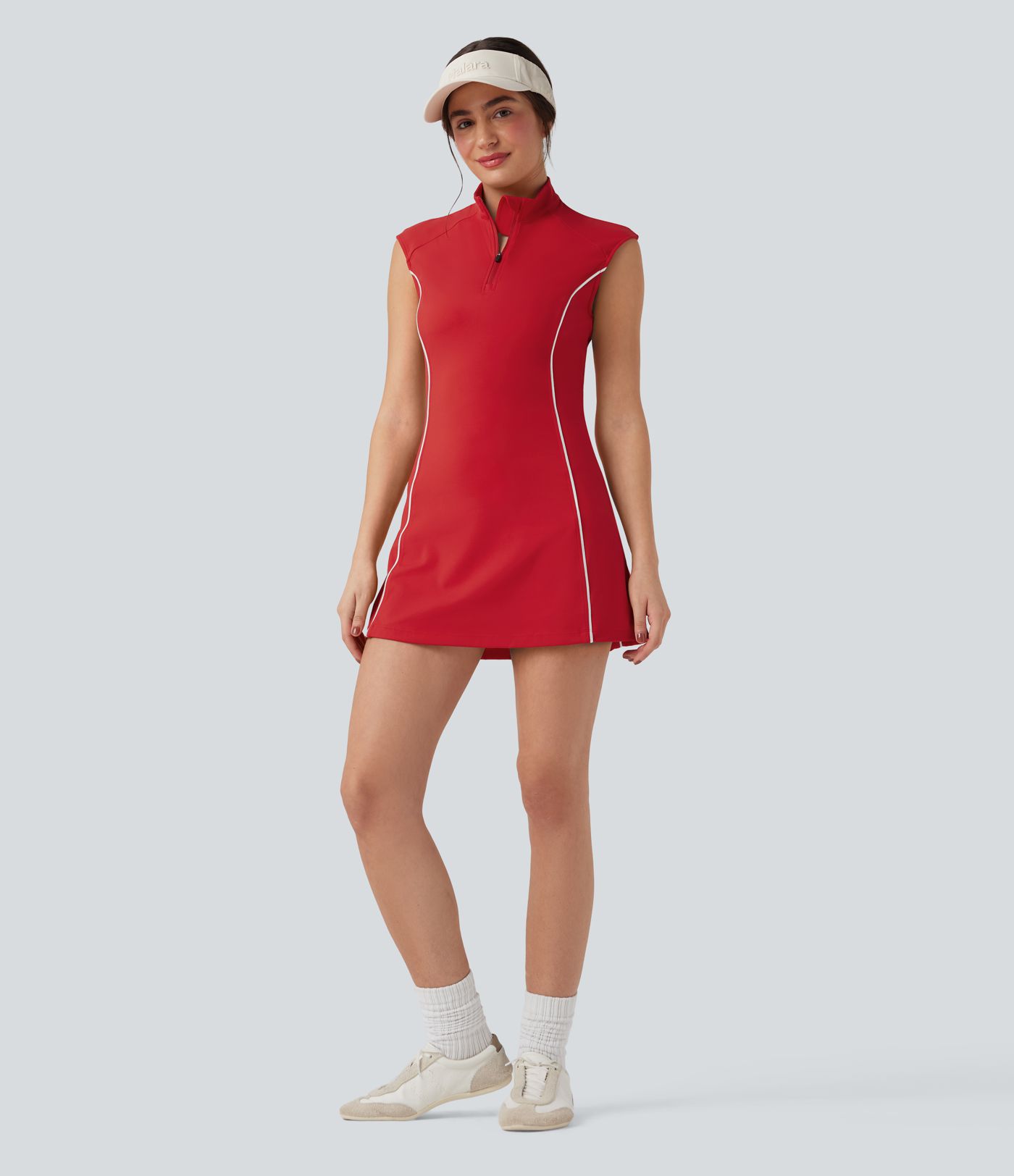 Softlyzero™ Plush - Sleeveless, 2-piece golf activewear dress with turtleneck, side pockets, golf tee pockets, and color block pattern