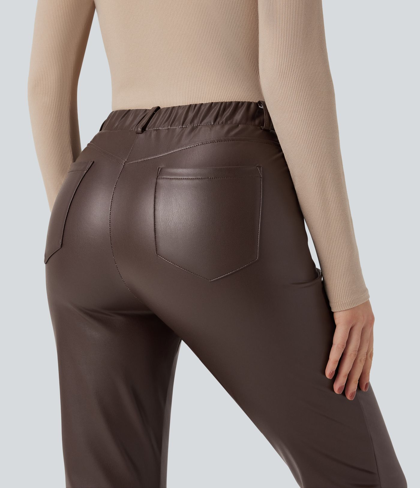 Pantalones casuales ajustados de tiro medio elásticos de PU con polar en largo 7/8 y con bolsillos