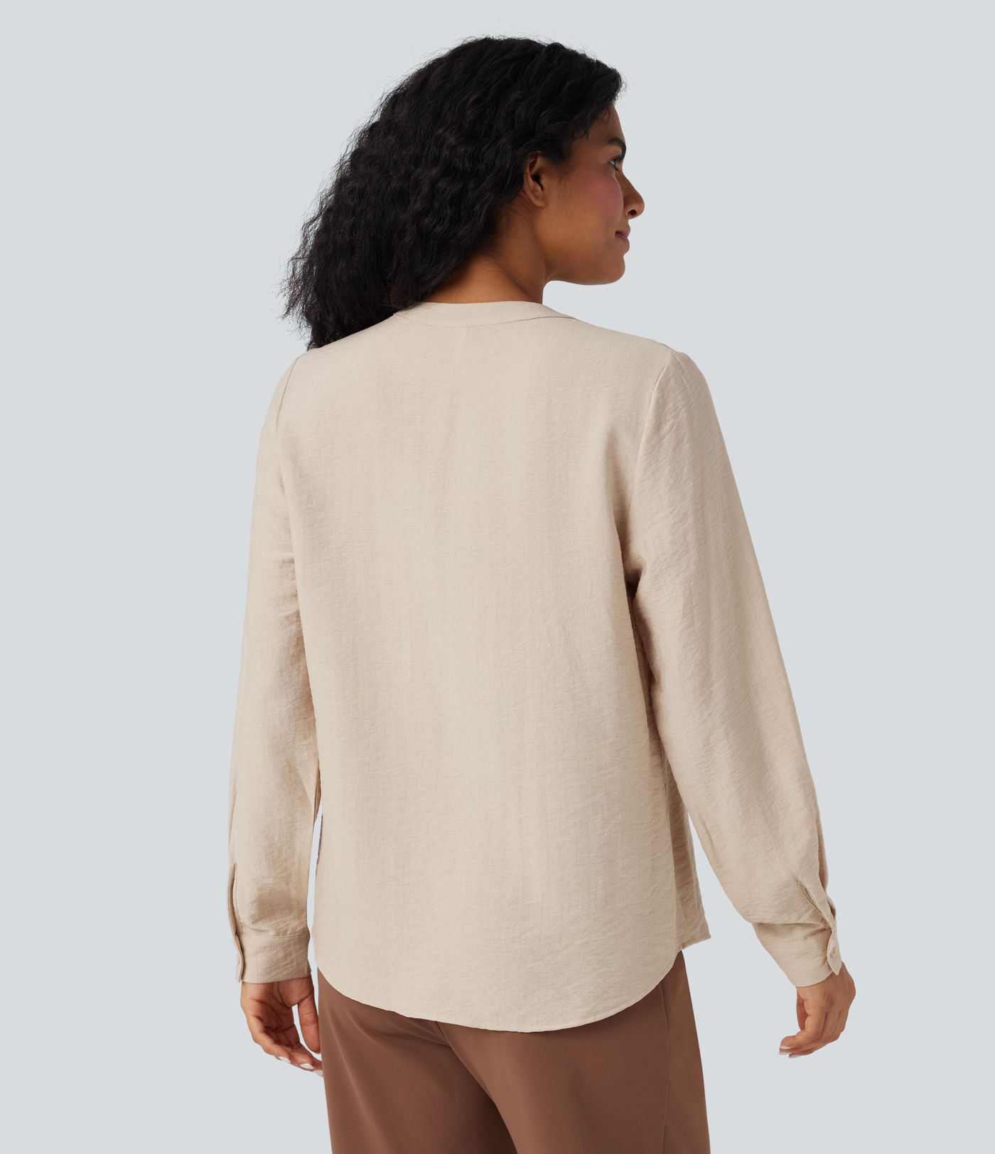Long-sleeve V-neck work blouse with pleats in a relaxed fit