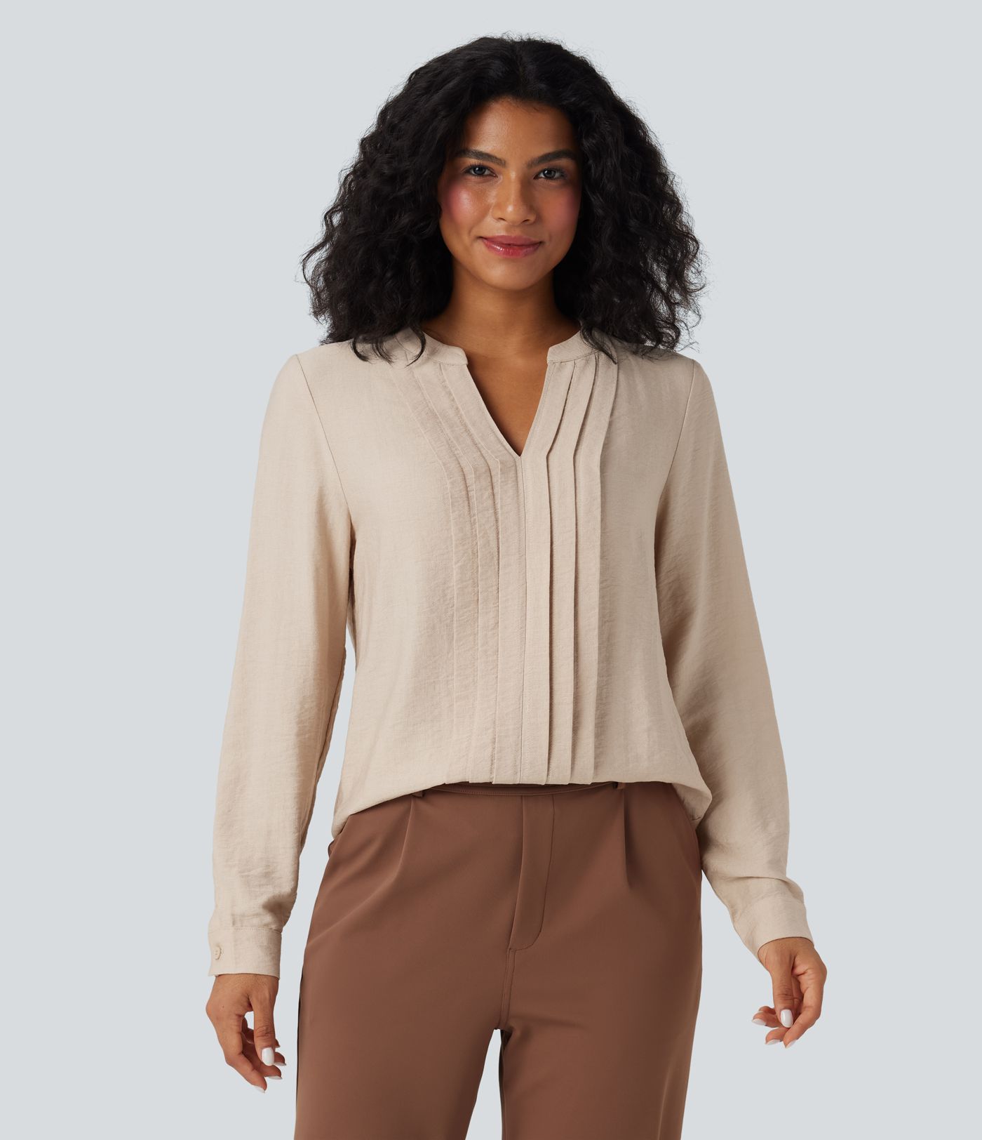 Long-sleeve V-neck work blouse with pleats in a relaxed fit