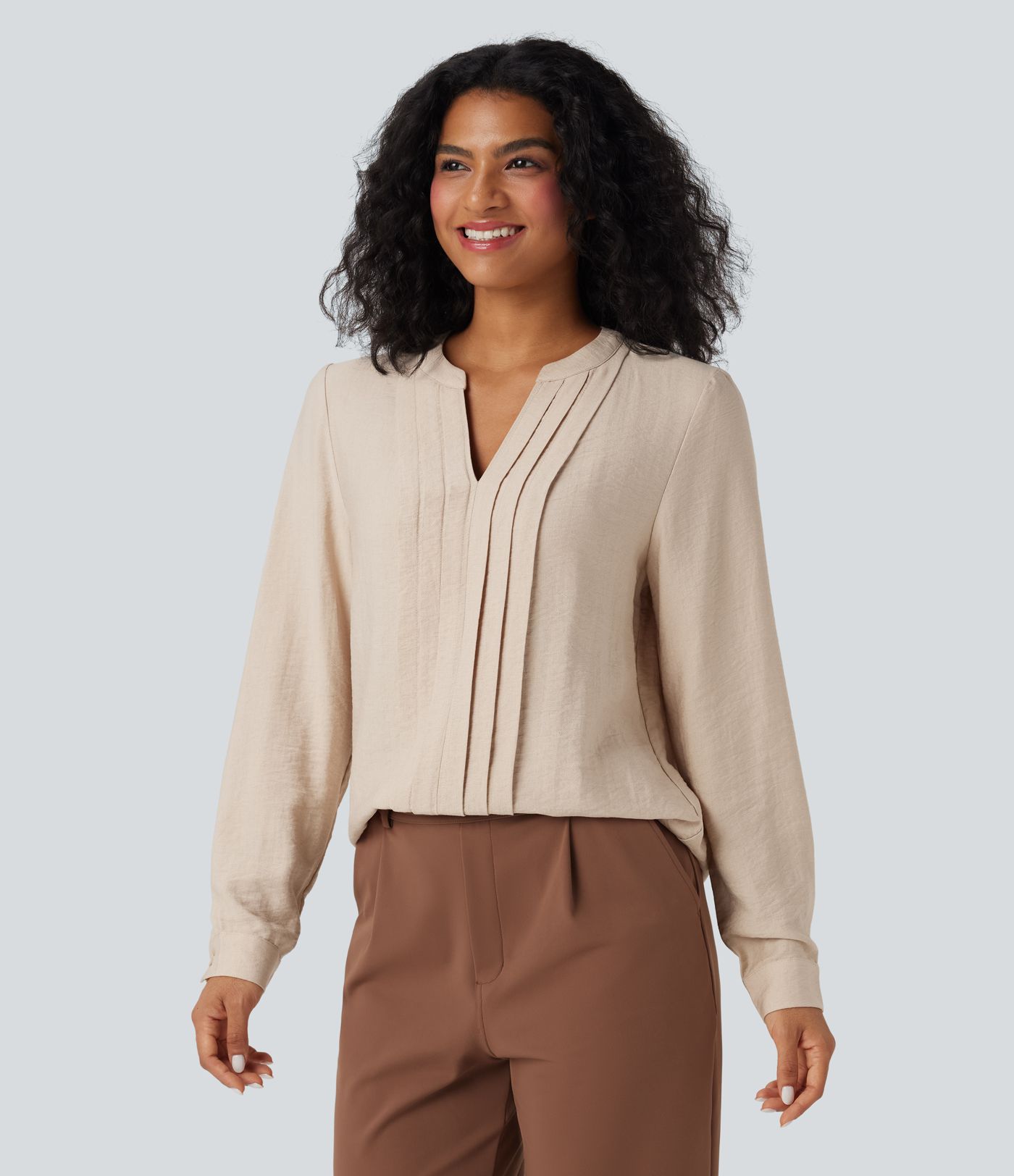 Long-sleeve V-neck work blouse with pleats in a relaxed fit