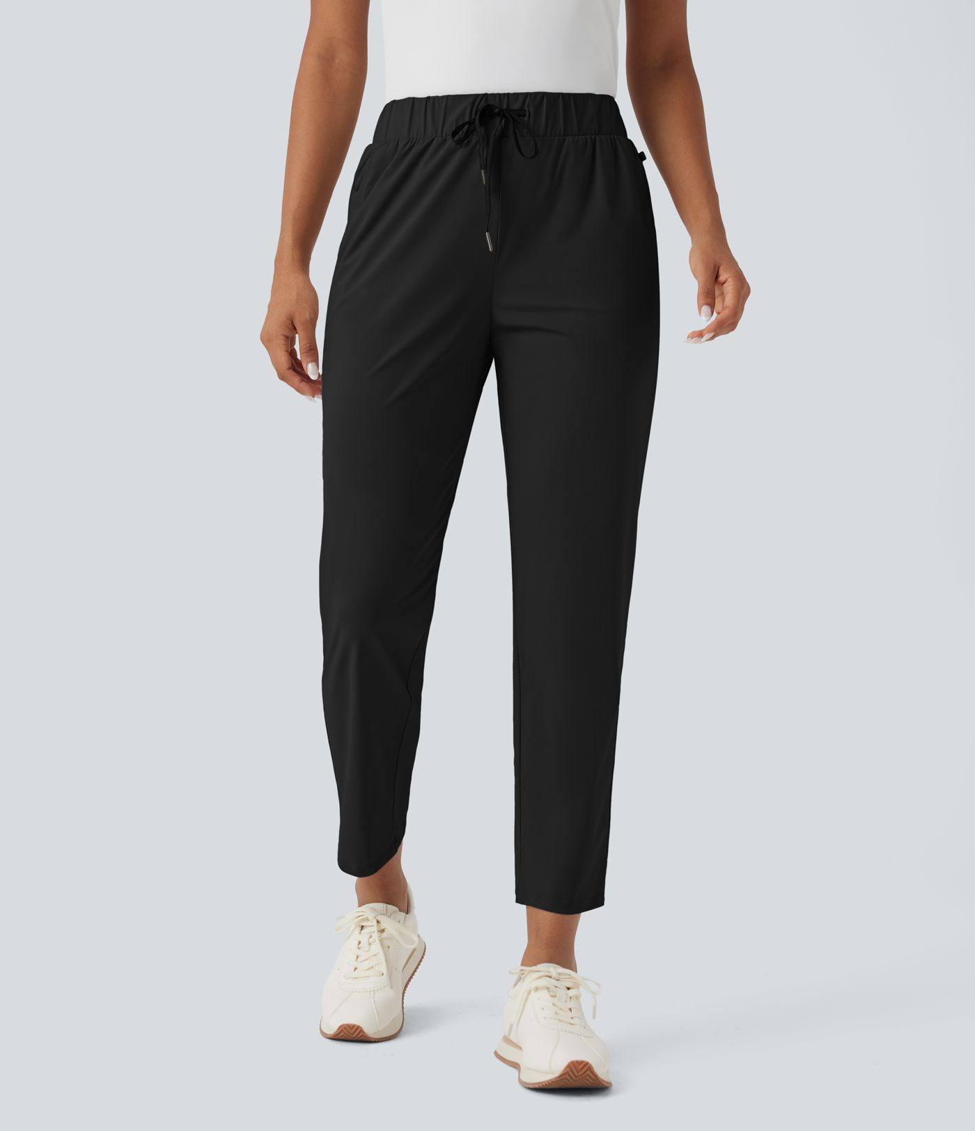 Konisch zulaufende Golfhose mit hohem Bund, Seitentaschen und Kordelzug - schnelltrocknend