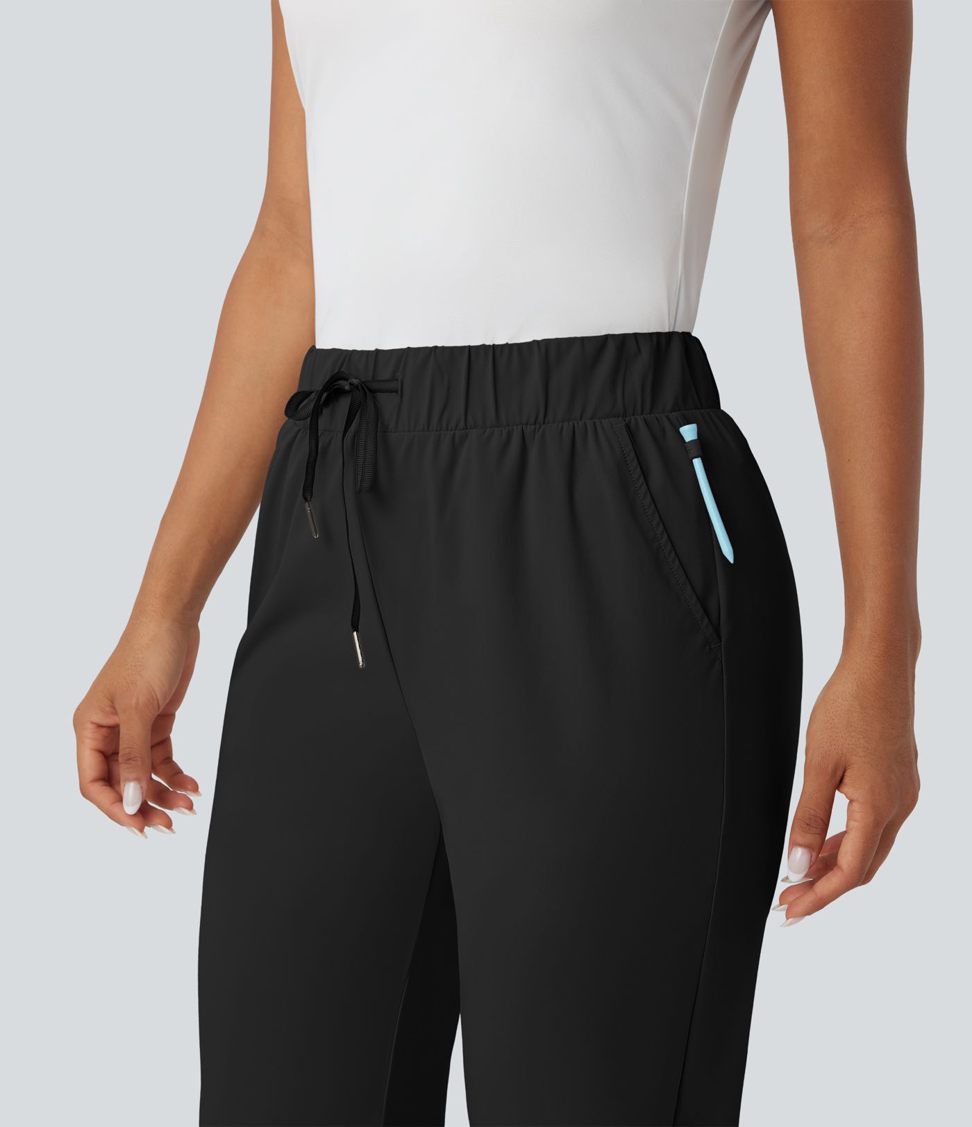 Konisch zulaufende Golfhose mit hohem Bund, Seitentaschen und Kordelzug - schnelltrocknend