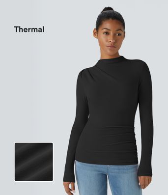 Enges, legeres Thermo-Oberteil mit Trichterhalsausschnitt, langen Ärmeln und Rüschen