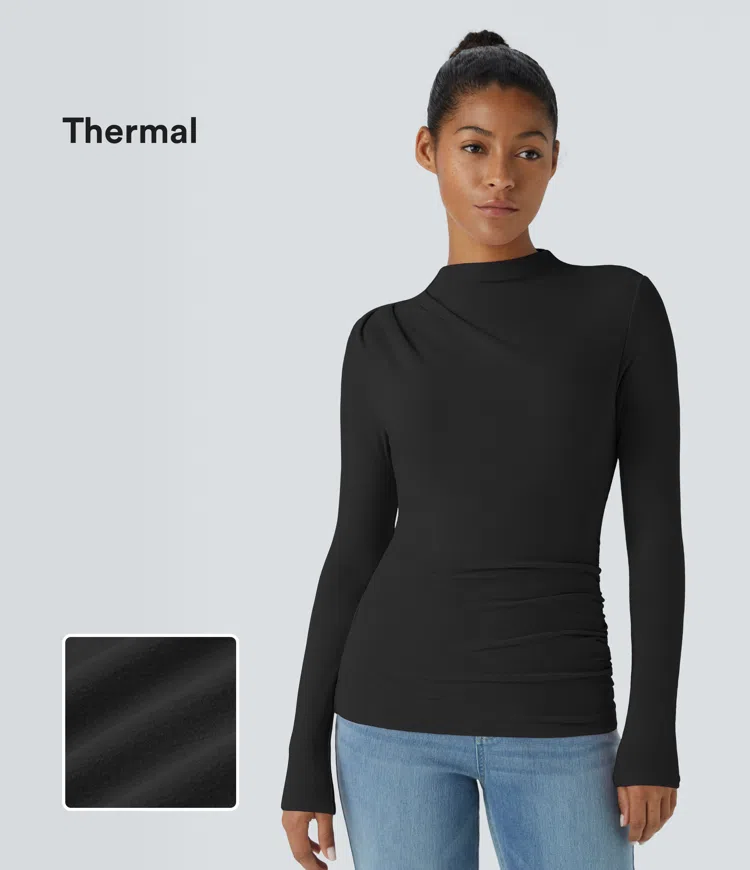Schwarz Enges, legeres Thermo-Oberteil mit Trichterhalsausschnitt, langen Ärmeln und Rüschen / 1