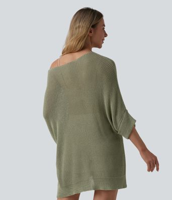 Jersey casual oversize de un hombro con media manga, abertura en el bajo y bolsillo