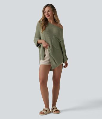 Jersey casual oversize de un hombro con media manga, abertura en el bajo y bolsillo