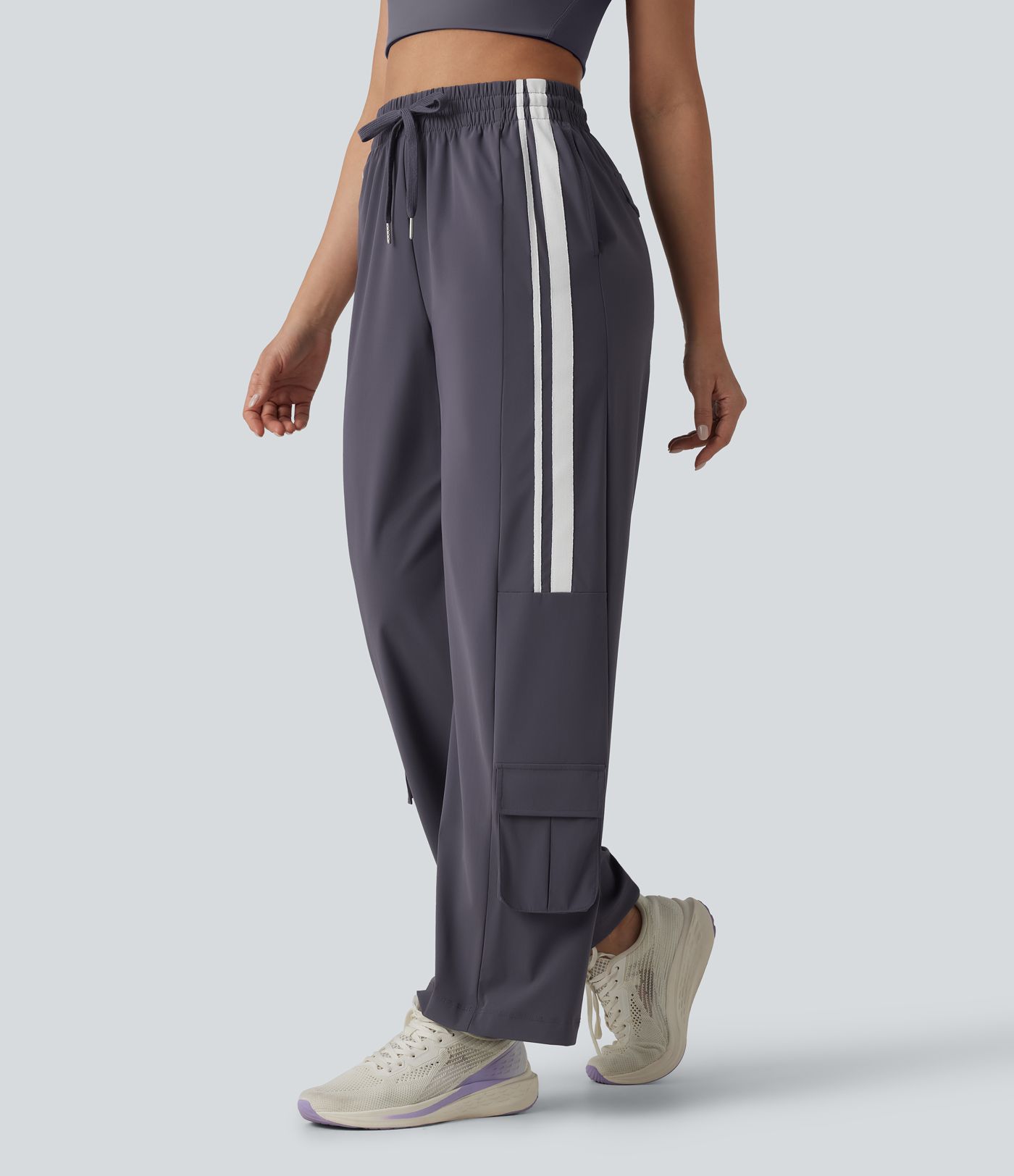 Workout-Cargo-Hose mit hohem Bund, mehreren Taschen, Kordelzug, Streifen und Farbblock - schnelltrocknend
