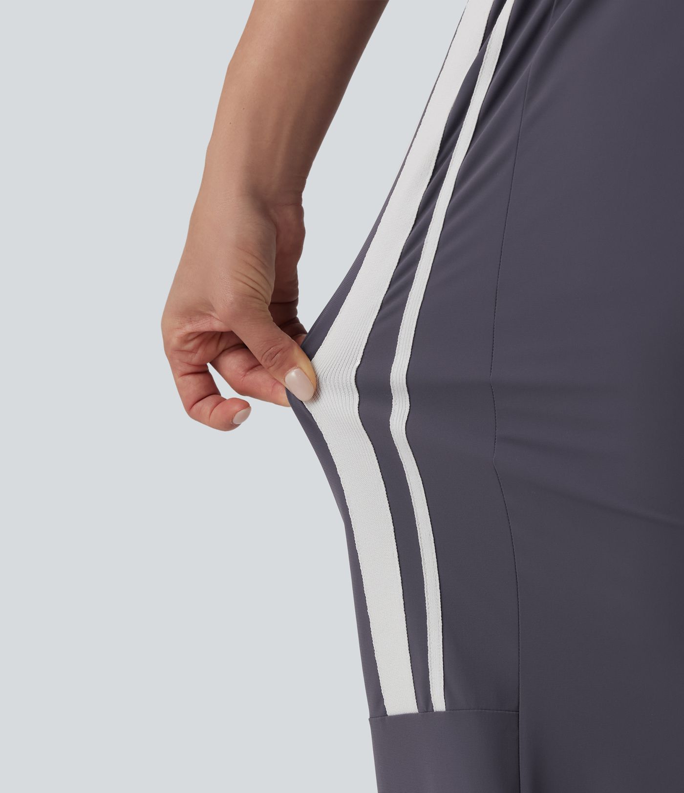 Workout-Cargo-Hose mit hohem Bund, mehreren Taschen, Kordelzug, Streifen und Farbblock - schnelltrocknend