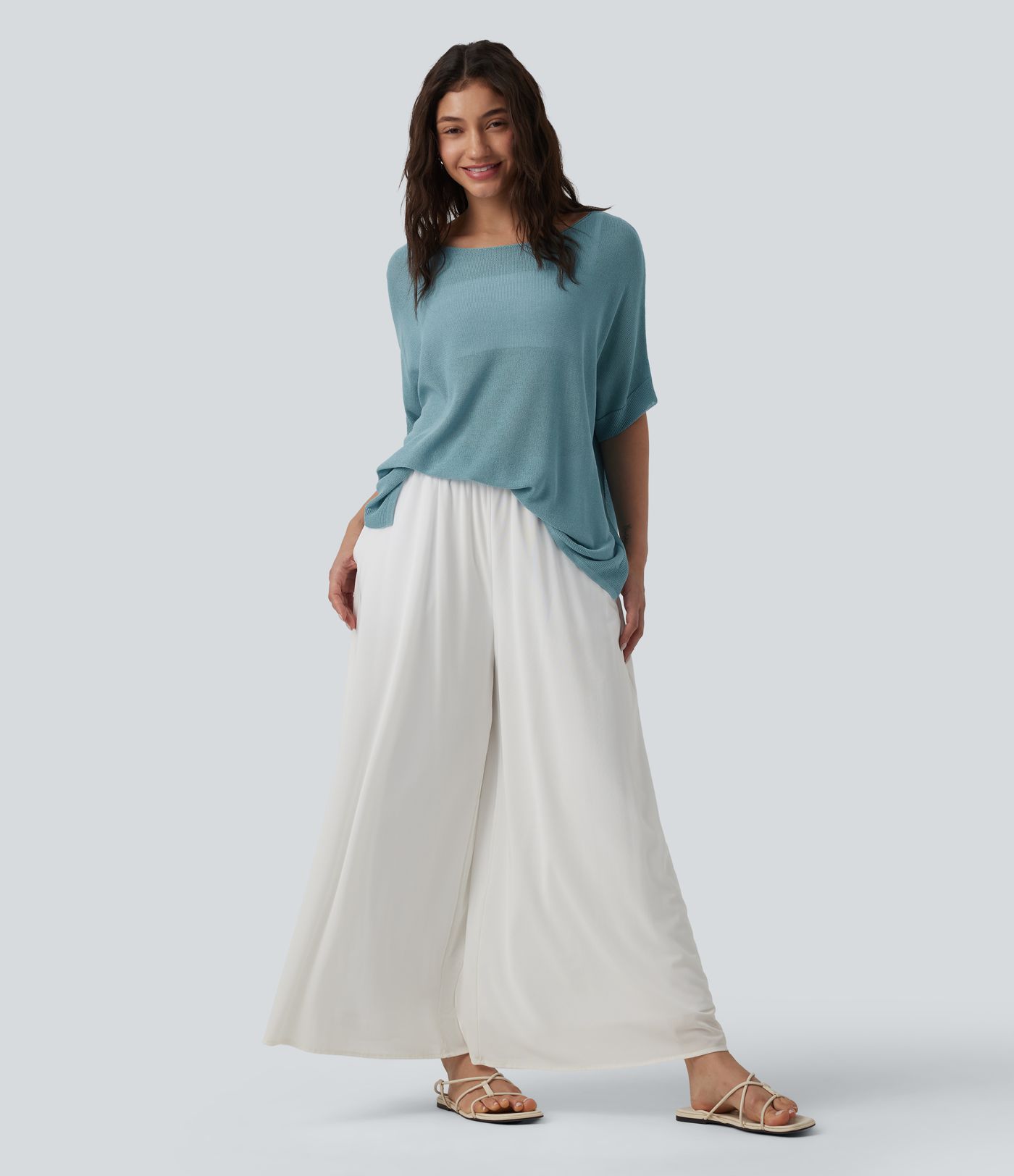 Pull décontracté semi-transparent à encolure bateau, quelques chauve-souris et ourlet fendu