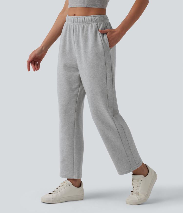 Lässige, schmal zulaufende Baumwoll-Jogginghose mit mittelhohem Bund, Seitentaschen und Kordelzug