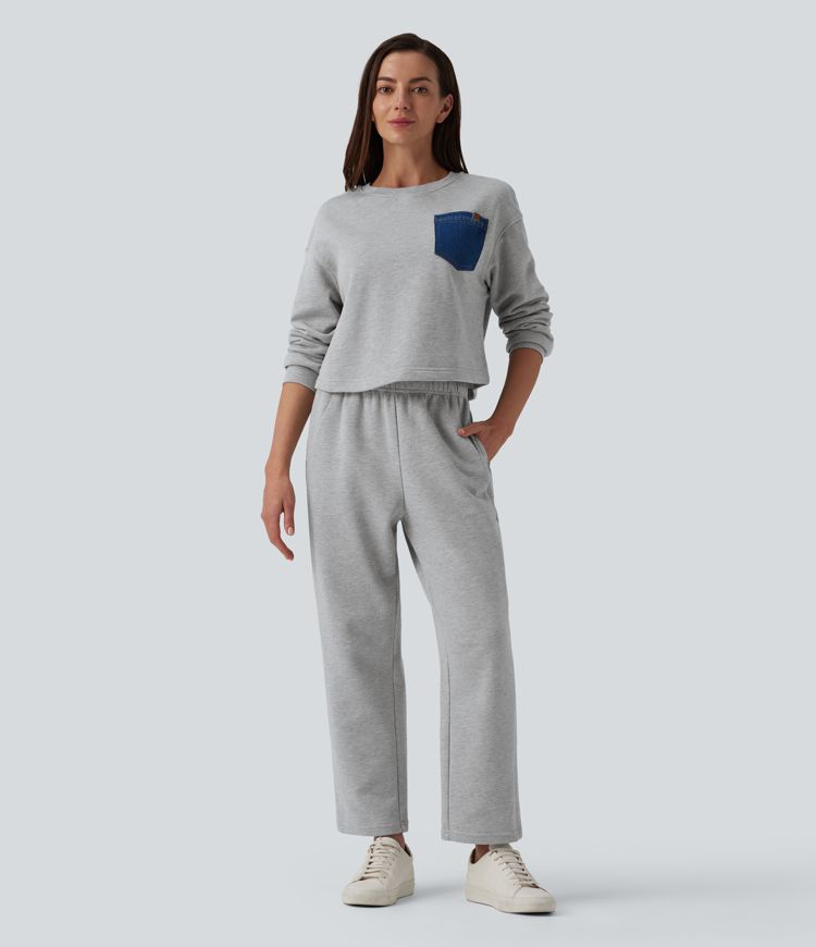 Lässige, schmal zulaufende Baumwoll-Jogginghose mit mittelhohem Bund, Seitentaschen und Kordelzug