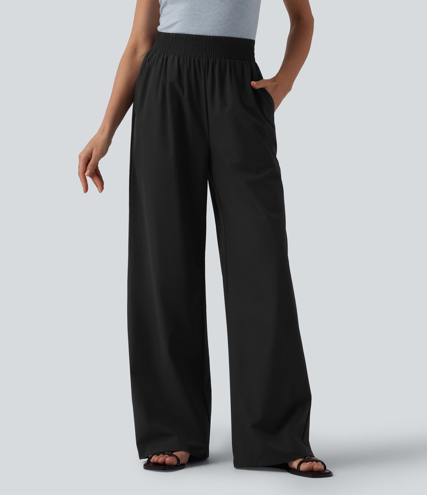 Spodnie na dzień z wysokim stanem, szerokimi nogawkami i kieszeniami