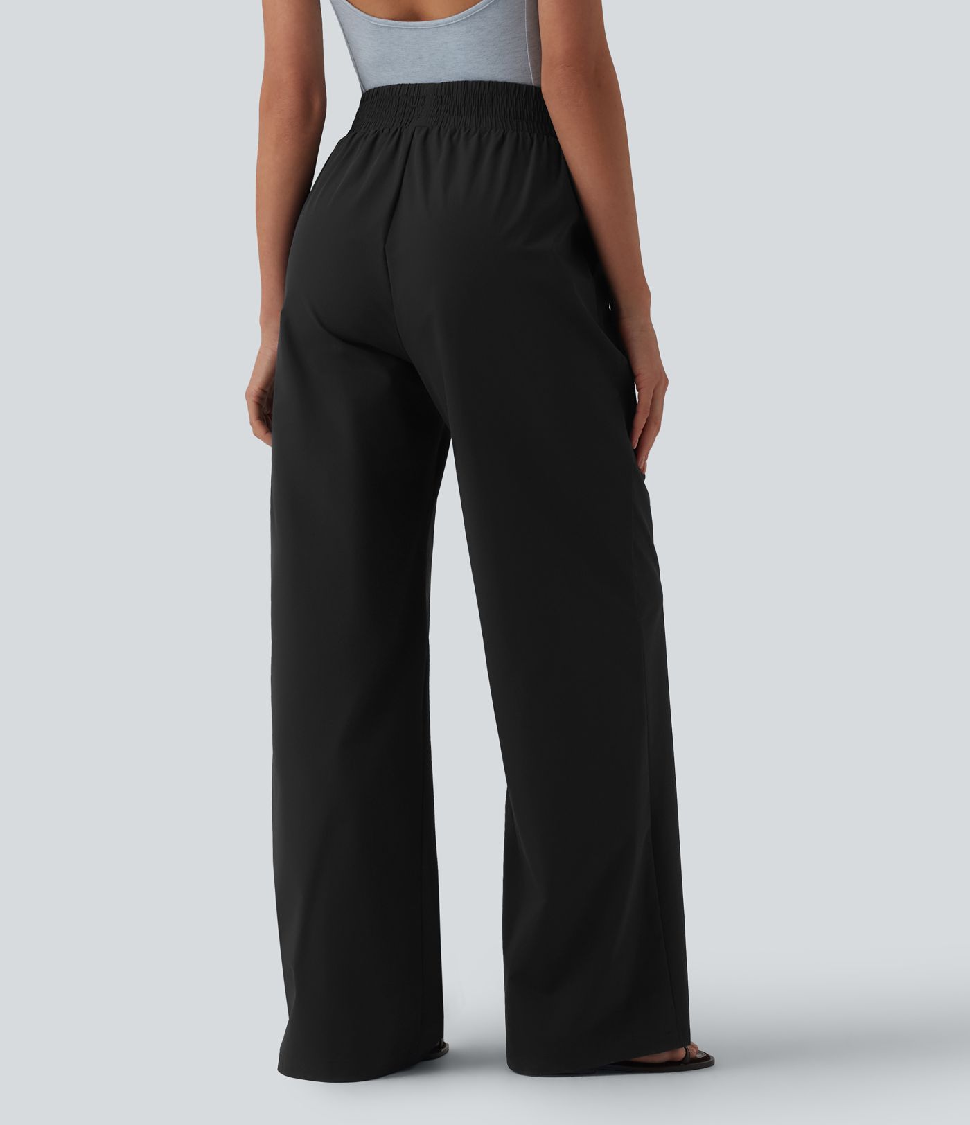 Spodnie na dzień z wysokim stanem, szerokimi nogawkami i kieszeniami