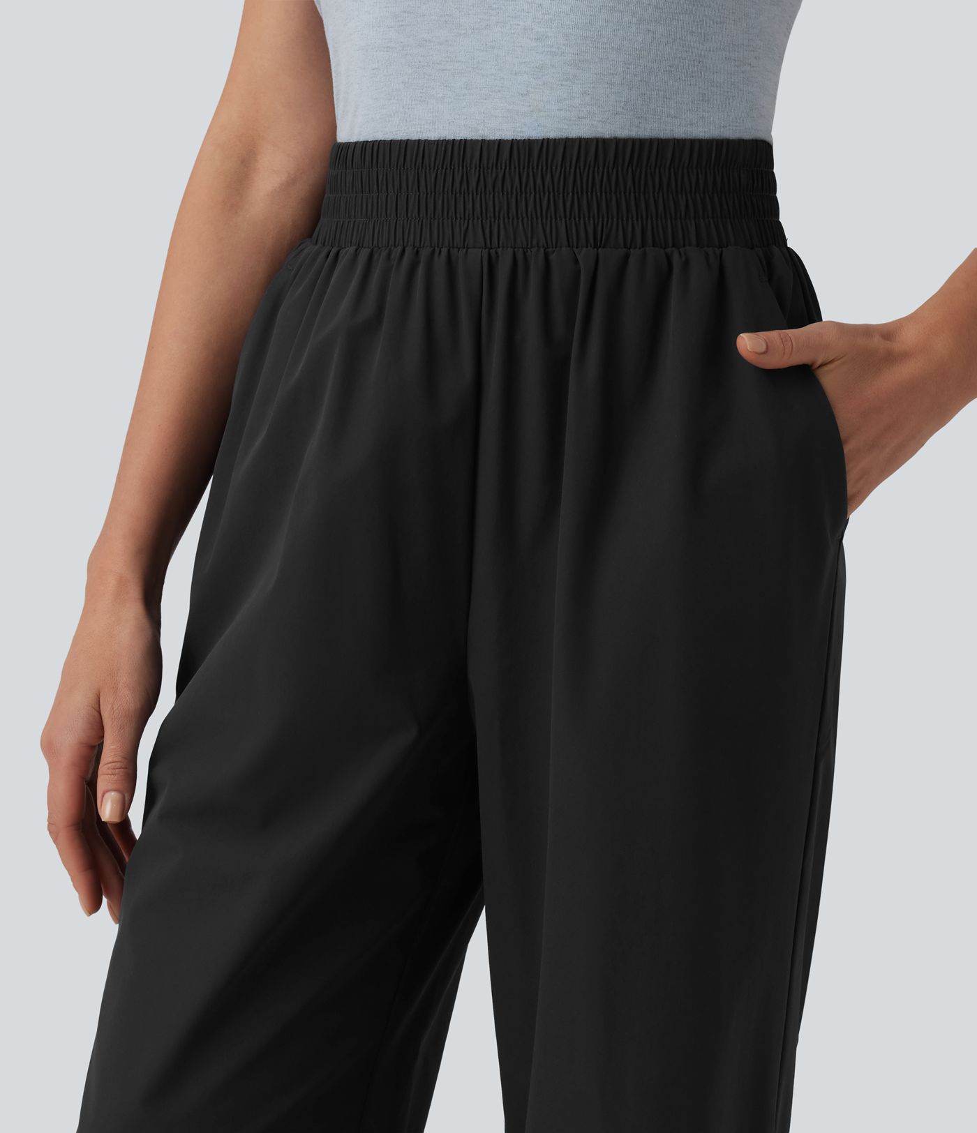 Spodnie na dzień z wysokim stanem, szerokimi nogawkami i kieszeniami