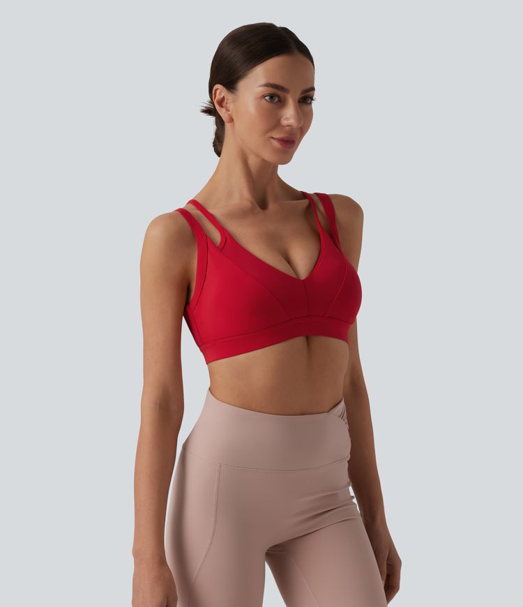 SoftlyZero™ Przewiewny sportowy biustonosz do jogi o ujawnionym podparciu, z pojawiającymi się ramiączkami, wychodzącymi z i określonym materiałem — UPF50+