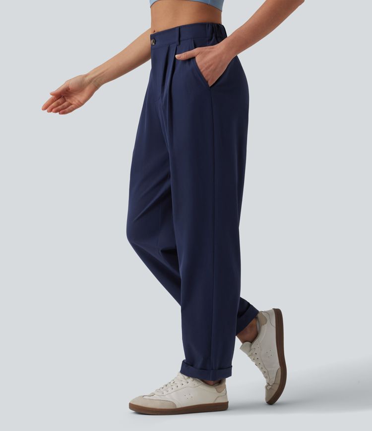 Lässige, schmal zulaufende 7/8-Hose mit mittelhohem Bund, mehreren Taschen und umgeschlagenem Saum