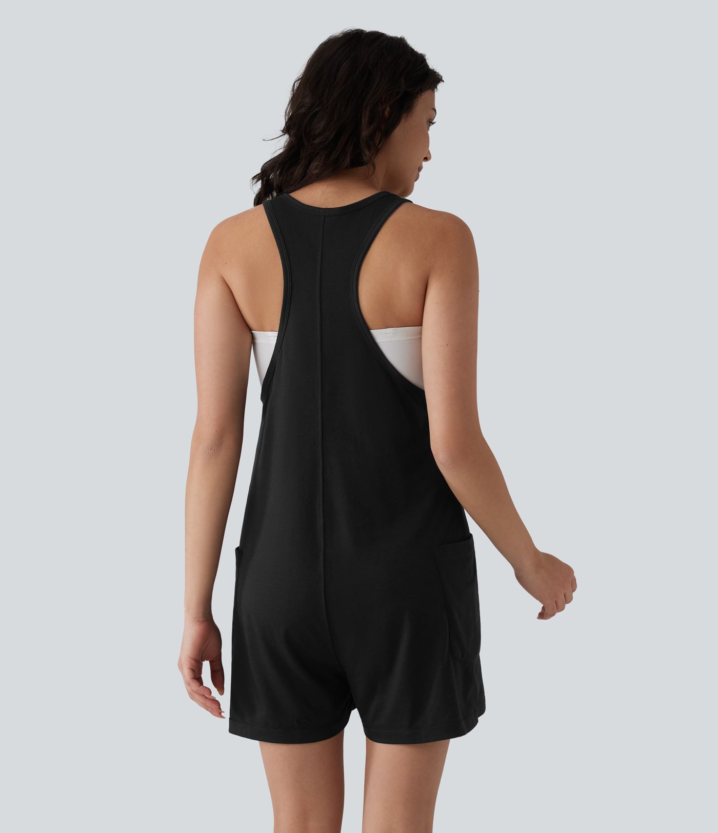 Melanżowy, codzienny kombinezon (romper) z dekoltem w formie liter U i kieszeniami.