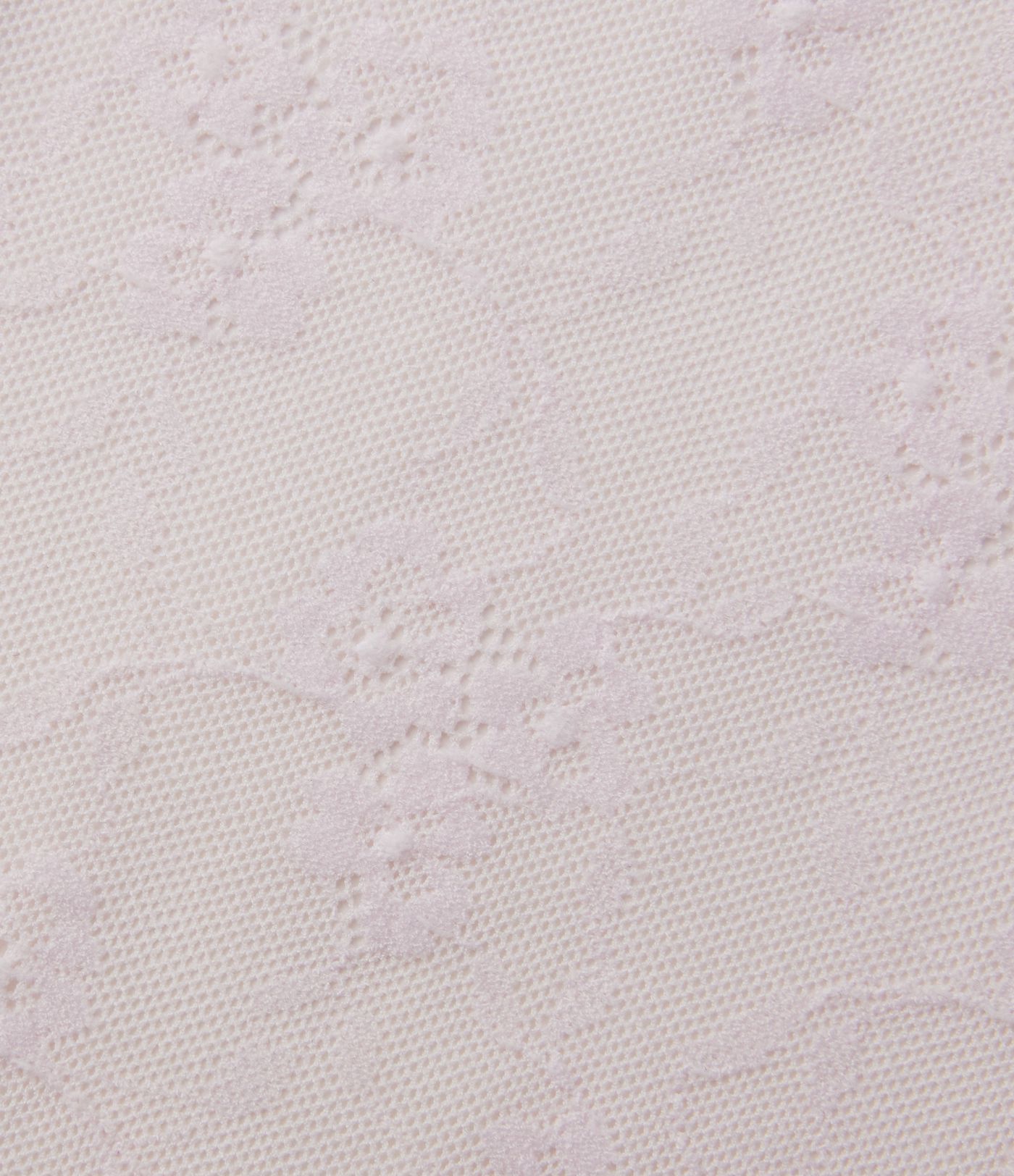 Débardeur en dentelle transparente à motif floral